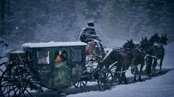 Horse drawn carriage battling through the snow, a scene from Dracula 2019