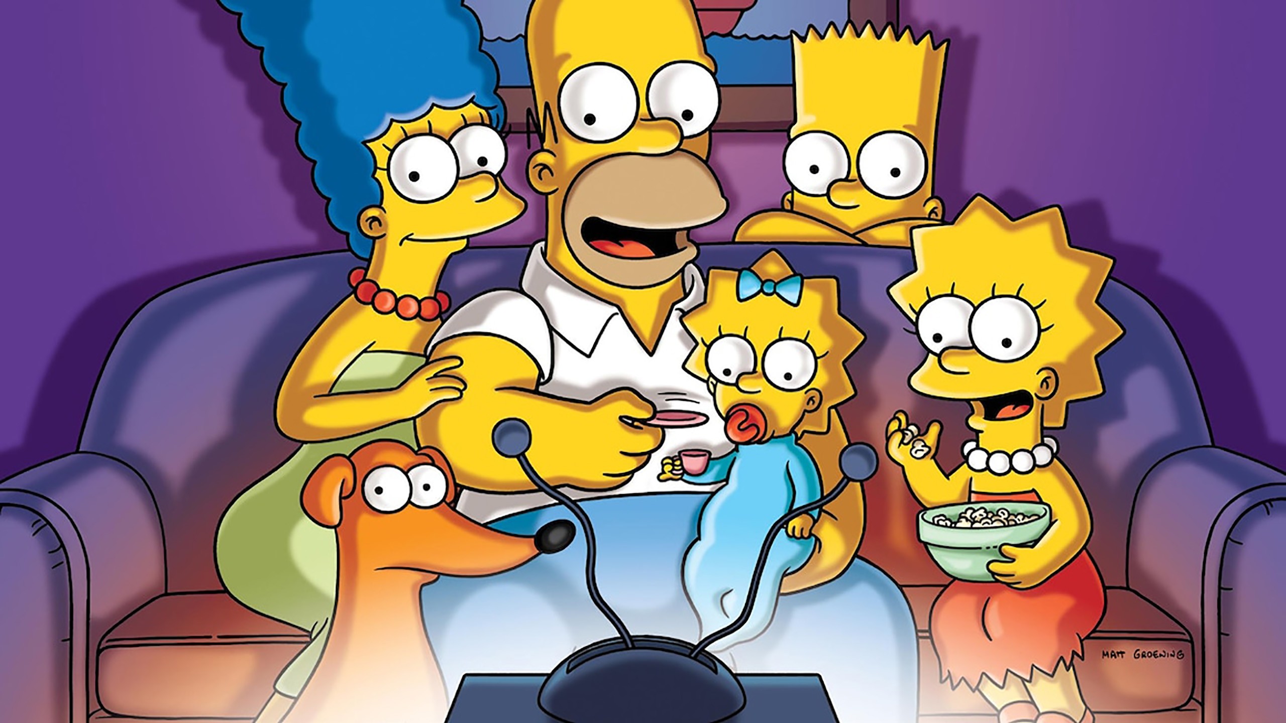 The Simpsons family watching TV